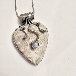 2 inch, silver, Fossil Coral and Rainbow Moonstone, pendant on a silver chain.